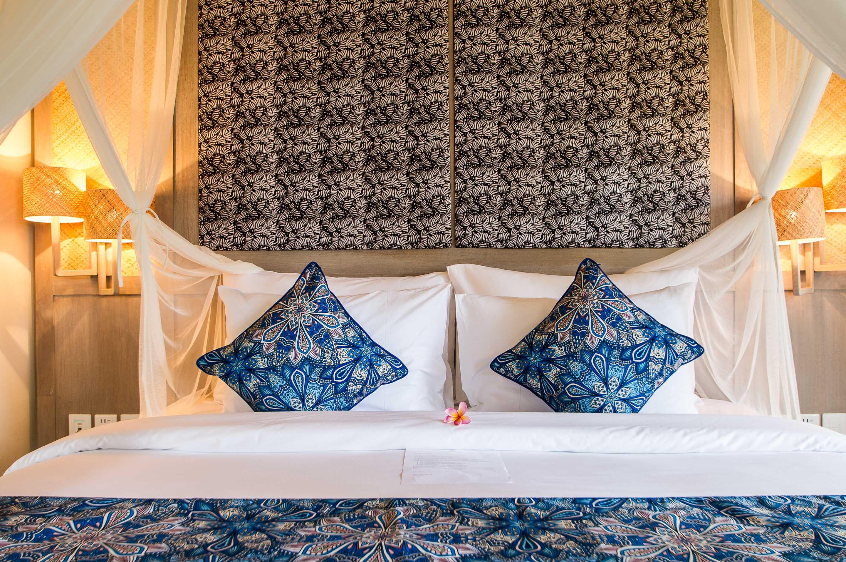 Nirwana Beach & Resort Candidasa Dış mekan fotoğraf A bed with a mosquito net